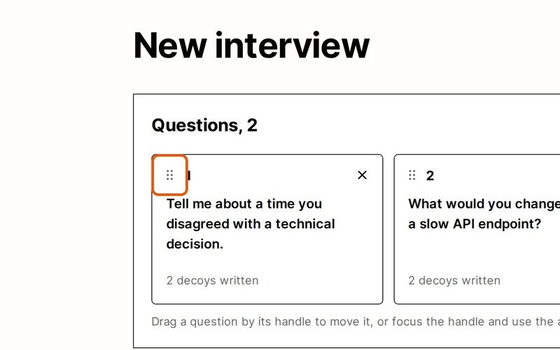 Drag a question by its dotted handle to change the order.